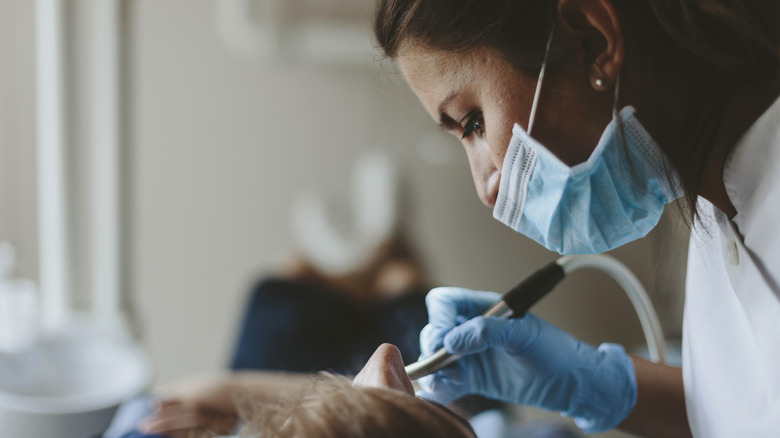 A dentist working