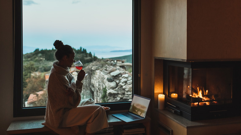 A woman in a cozy cabin