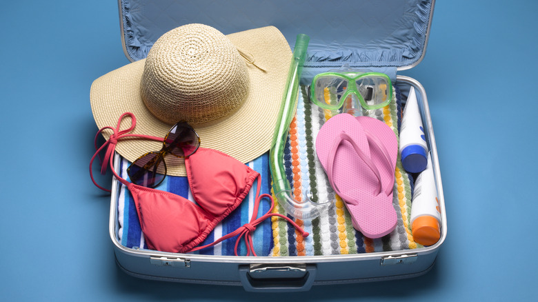 Luggage with swimwear inside