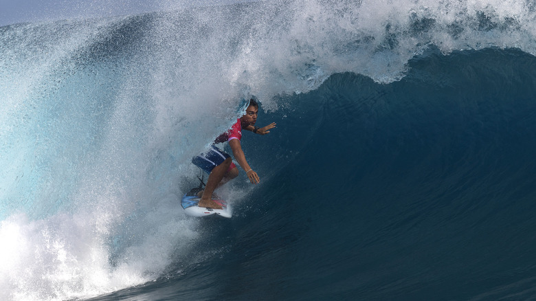 man surfing at Teahupo'o