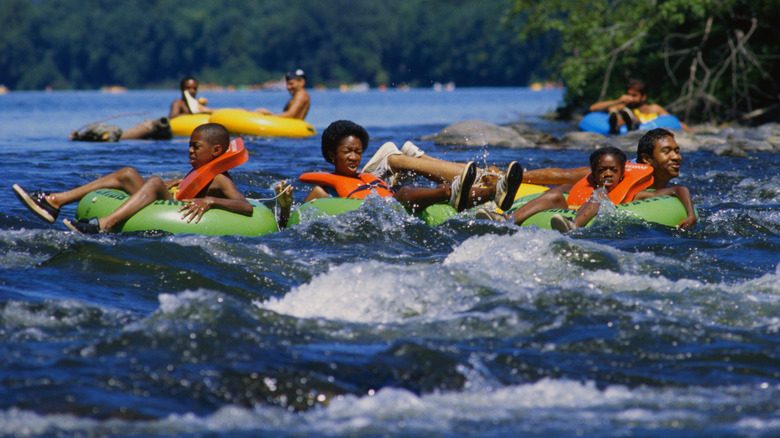 A family tubing on a river 