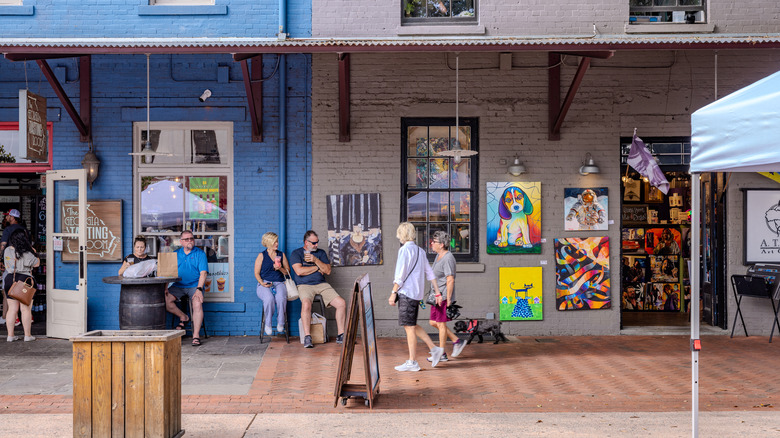 street with art and people