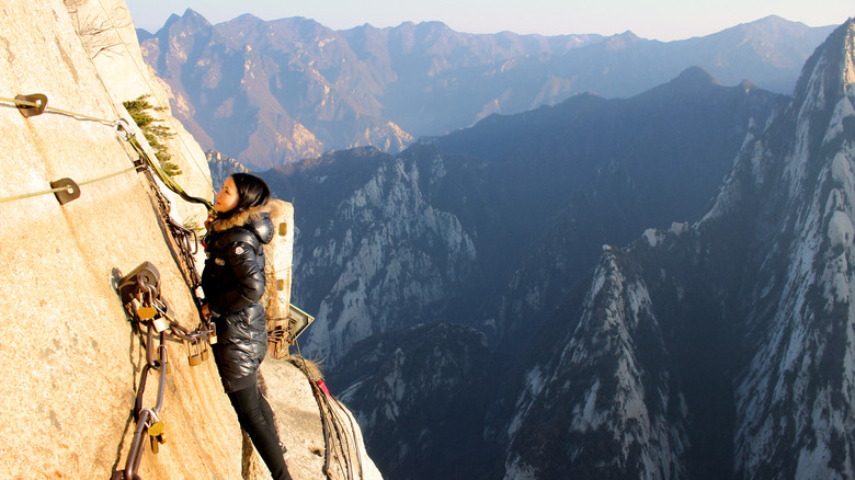 Woman climbing Mount Huashan