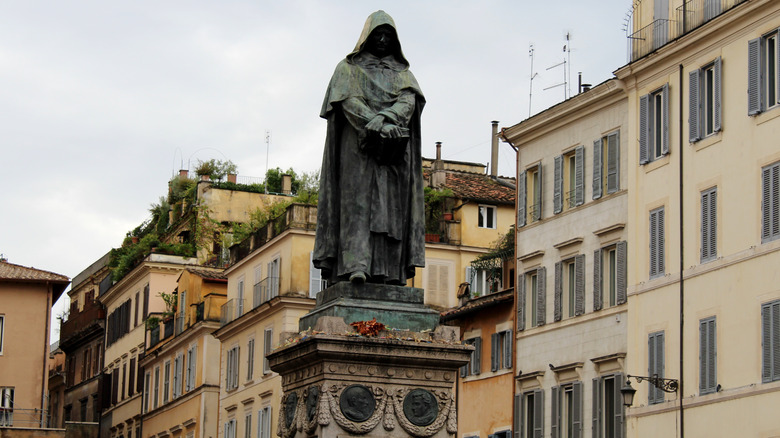 Hooded statue on a pedestal