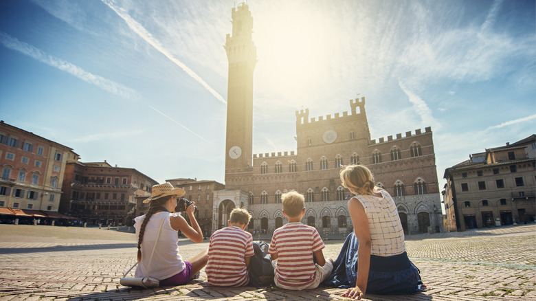 Family in Siena, Italy's main plaza