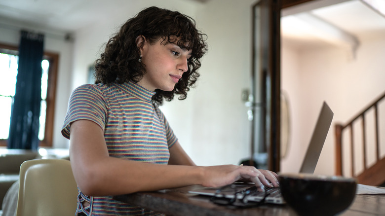 Woman using her laptop