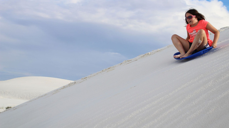 sledding at White Sands National Park