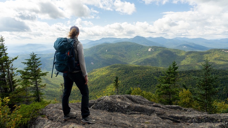 Hiker backpacking through the mountains