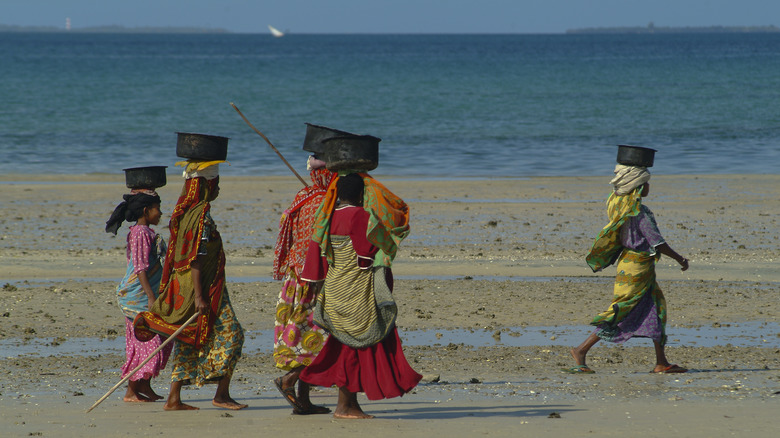 Women on a beach in Pemba