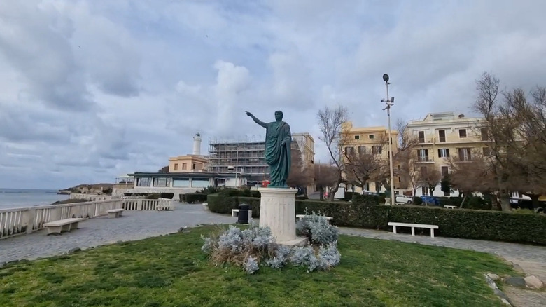 Nero statue in park by lighthouse