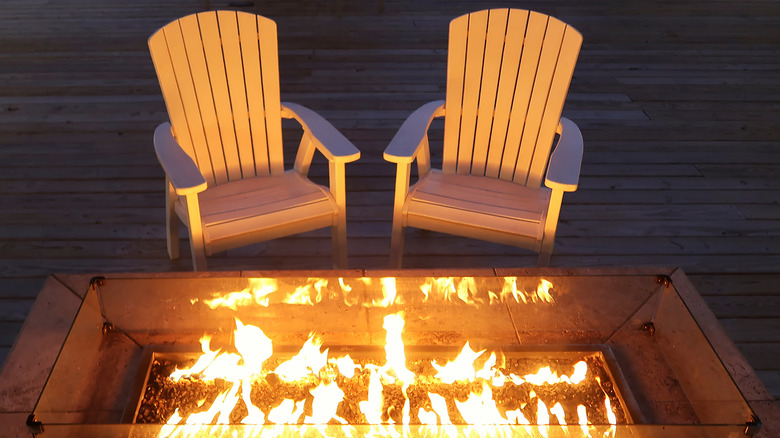 a pair of chairs at a fire pit in Dewey Beach, Delaware