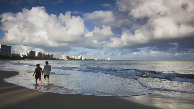 People walking along Isla Verde