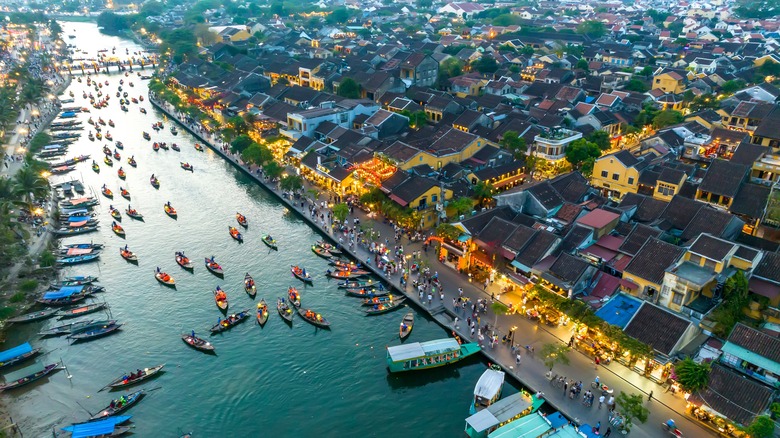 Vietnamese boats along a canal