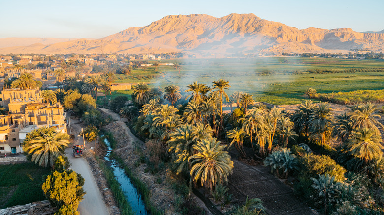 Luxor village with mountains in background