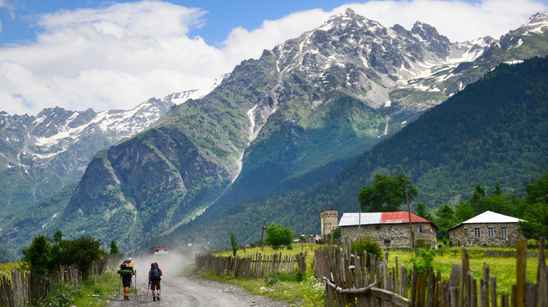 Hikers trekking in Svaneti, Georgia