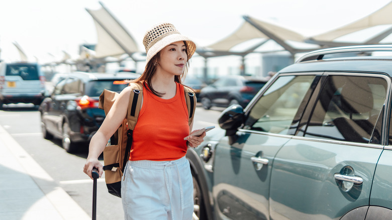 An individual waiting to leave the airport as seen in photos