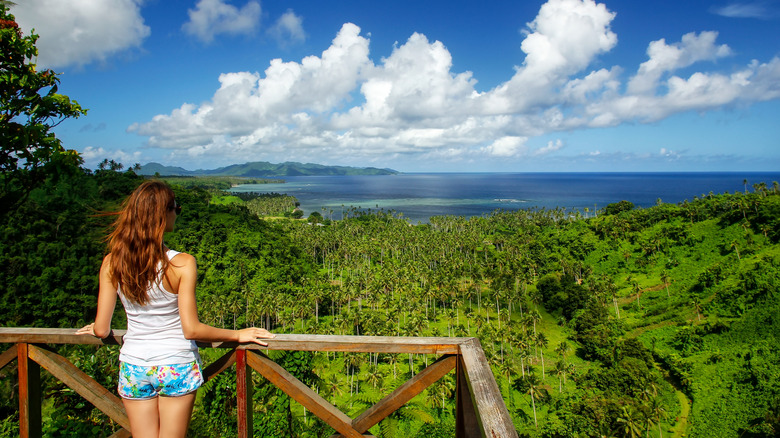 woman on deck admiring Fiji