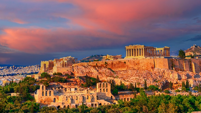 Ruins of Athens against a pink sky