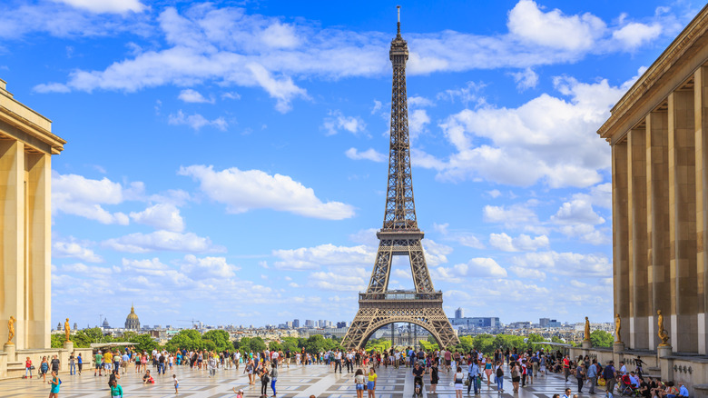 Crowds near Eiffel Tower on a bright day