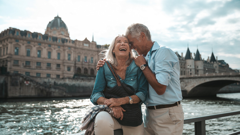 Smiling senior couple on vacation in Europe