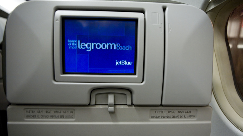 In-flight entertainment screen talking about legroom in coach on JetBlue Airways