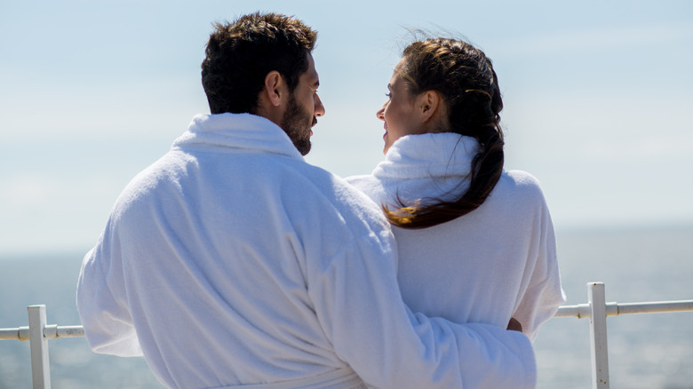 Couple in bath robes on a cruise ship