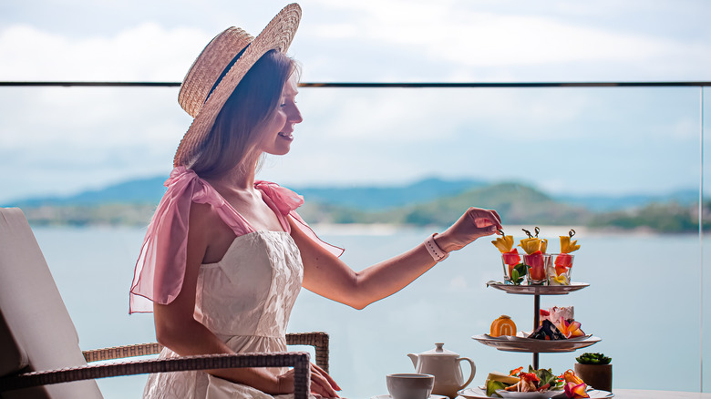 Woman on a cruise ship enjoying snacks