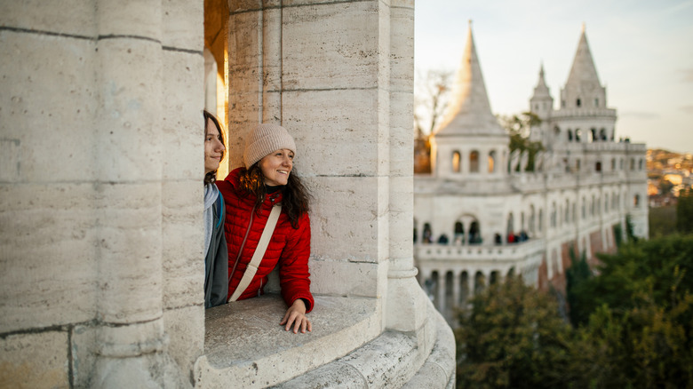 Mother and son at Fisherman's bastion in Budapest, enjoying the view