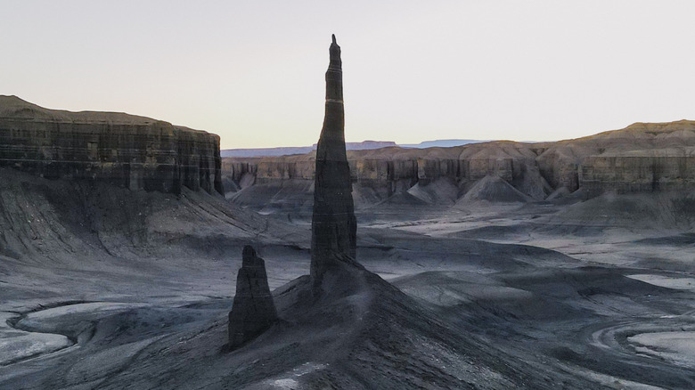 Towering sandstone spire in desert