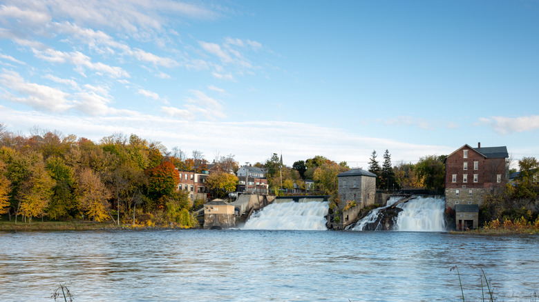 Waterfalls surrounded by trees and buildings in Vergennes, Vermont