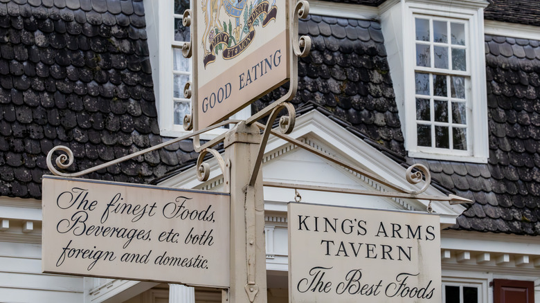 The signs outside the King's Arms Tavern in Colonial Williamsburg, Virginia