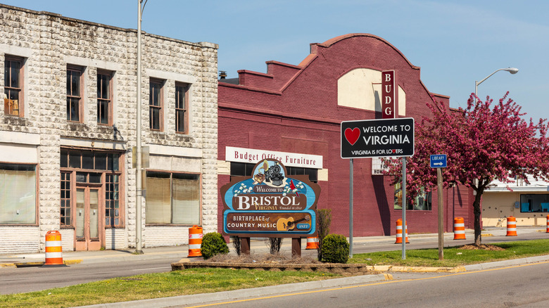 Bristol, Virginia's iconic welcome sign next to the state sign