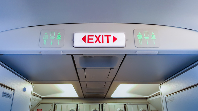 Exit sign and lavatory signs on aircraft