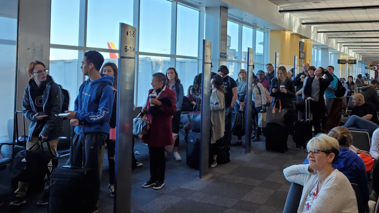 People lining up in position for a Southwest Airlines flight