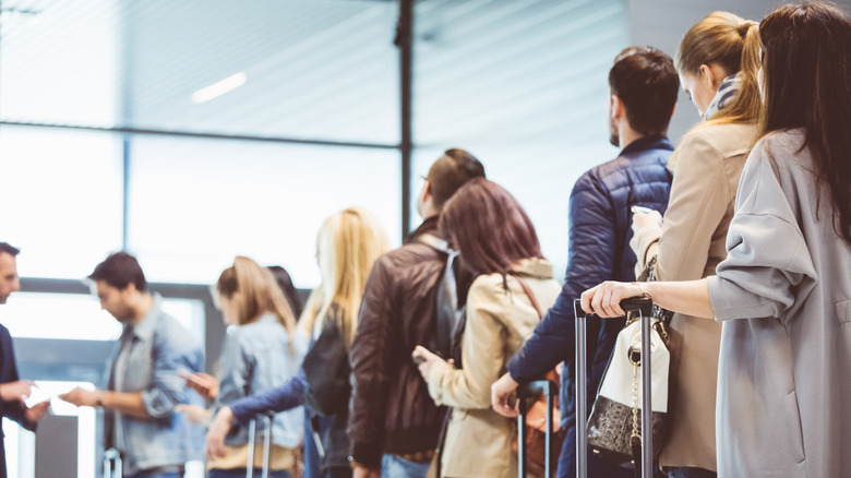 People waiting to board a plane