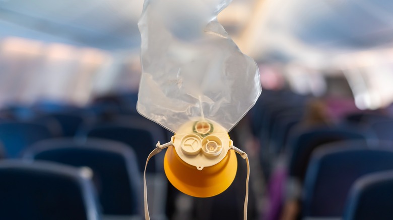 Oxygen mask dropped from plane ceiling
