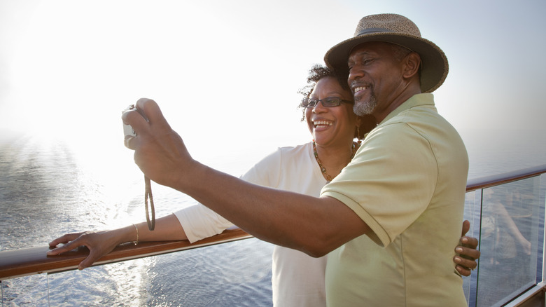 Couple taking a selfie on a cruise ship