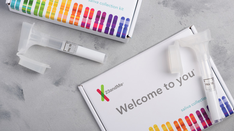 a 23andMe test kit laid out on a table