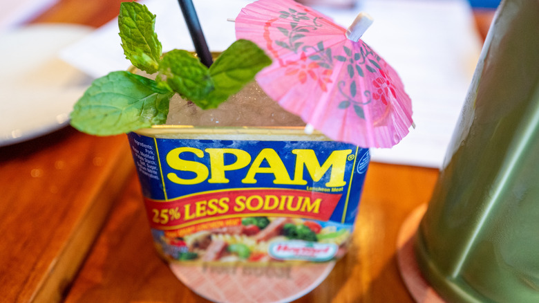 Mai tai cocktail served in a SPAM container