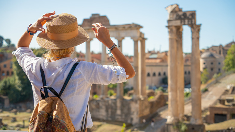 Woman sightseeing at the Roman Forum in Italy