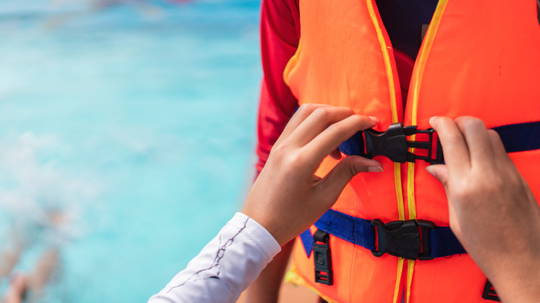 Child wearing life jacket 