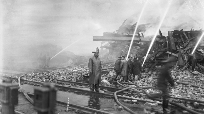 Firemen putting out the aftermath of the Black Tom explosion