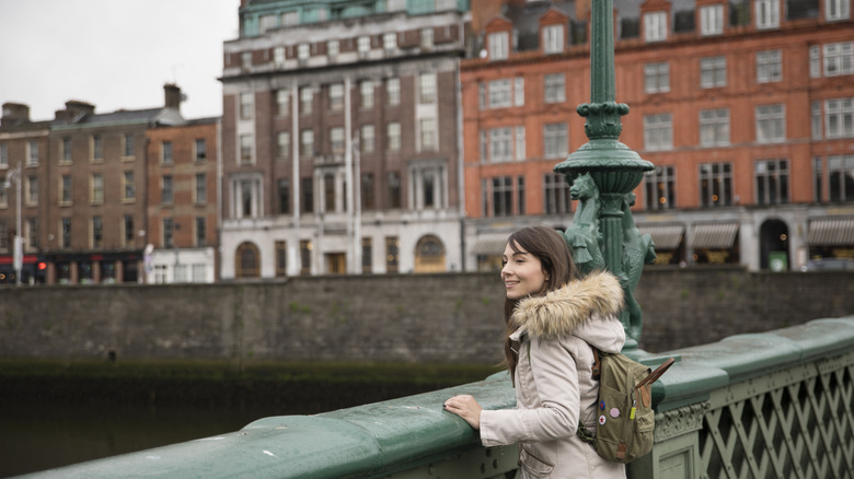 Woman on a bridge in Dublin, Ireland