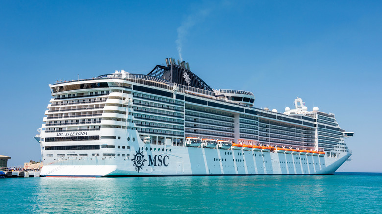 A cruise ship floating on the water on a clear day