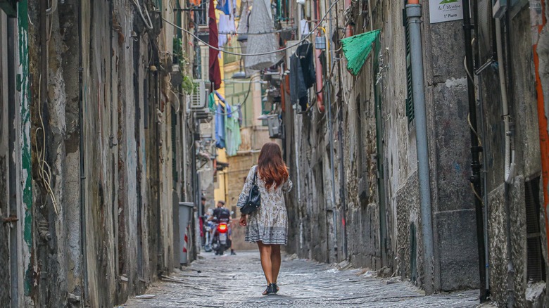 A woman walking in Naples