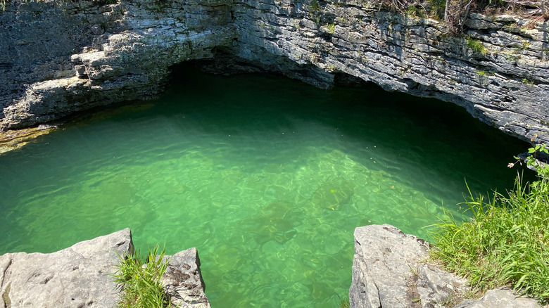 The green-tinted waters of Cave Point County Park