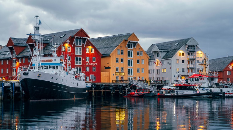 Colorful waterfront buildings and boats.