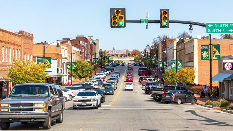 Cars drive between the red-brick buildings of downtown Wytheville