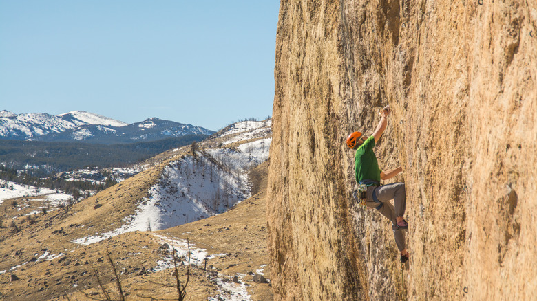 Rock climbing with a winter scenery