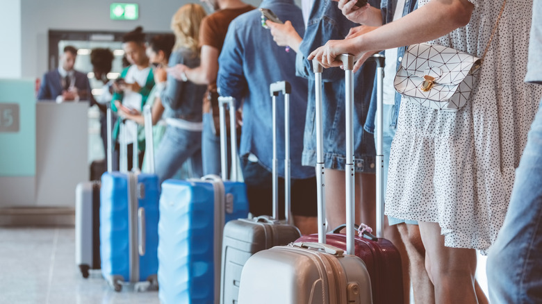 People boarding their plane